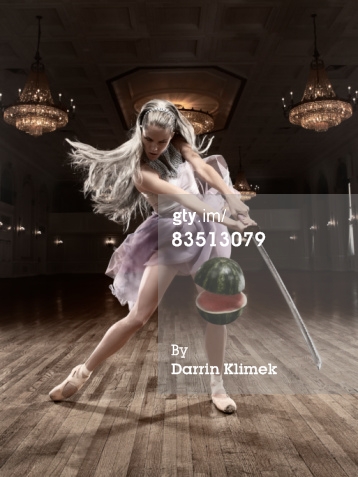 Ballerina slicing a watermelon